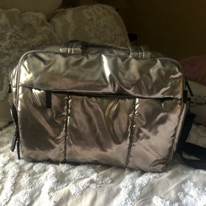 Calpak Luka Duffel rose gold